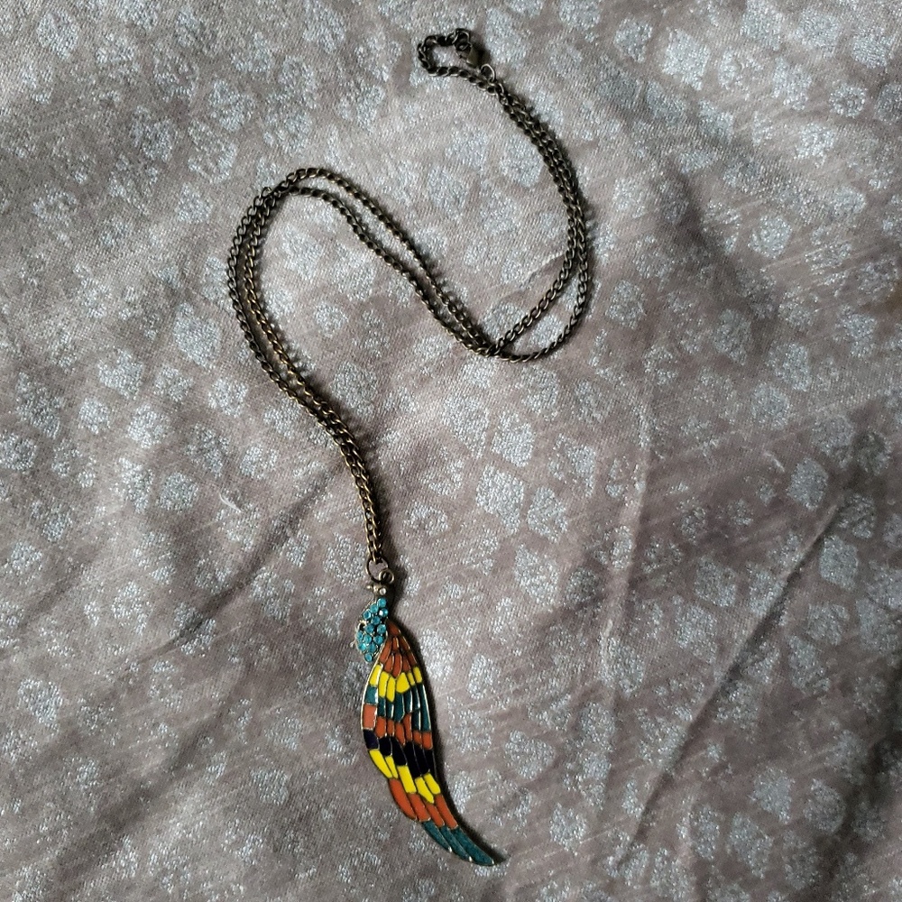 Antiqued gold peacock long necklace